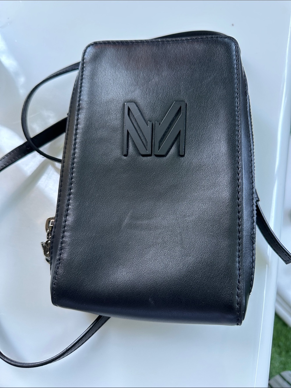 Black Crossbody Bag with Raised 'M' Logo